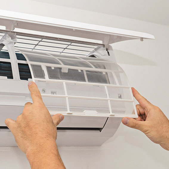 AC repair contractor finishing an air conditioning repair in Perrysburg, OH