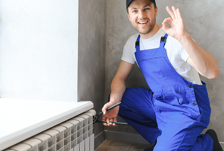 Rick's Affordable Heating & Cooling technician happy to perform heat pump repair in Perrysburg, OH